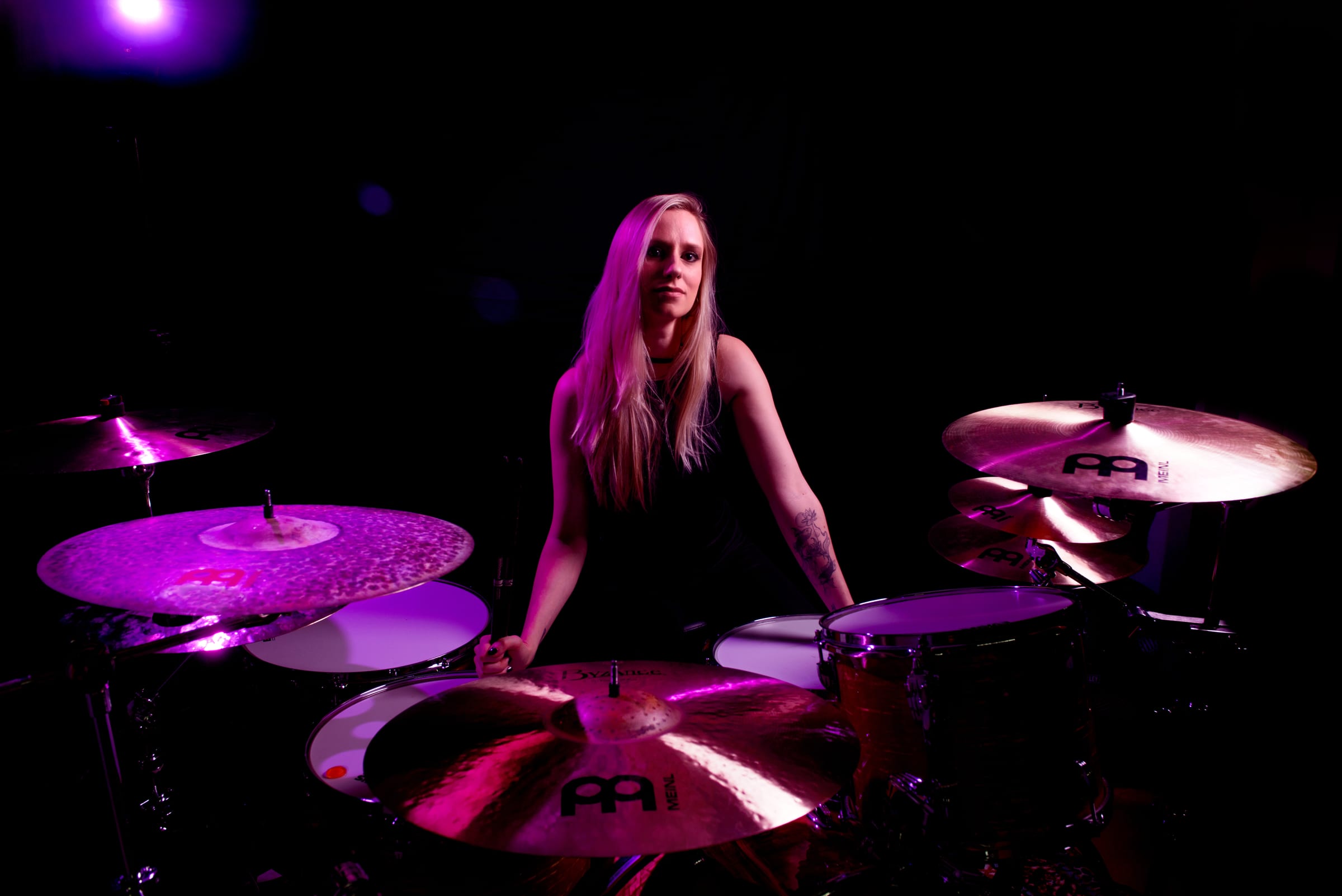Anna Mylee playing drums